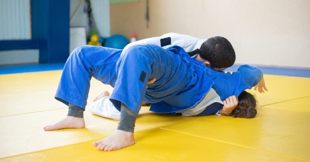 Grapplers maintaining side control during drilling for BJJ fundamentals